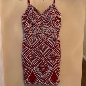 Selling a Jovani red dress . Was a size 10 altered to a size 6